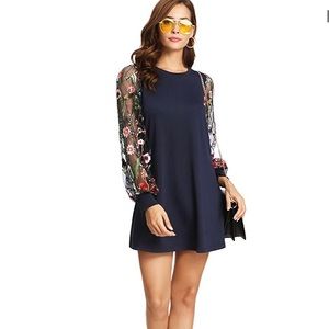 Tunic dress with embroidered floral sleeve